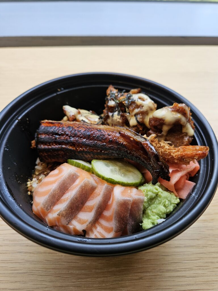 Photo of my takeaway Donburi Moriwase, a Japanese rice-bowl dish with veggies and proteins